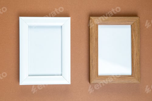 Preview: top view elegant picture frames on brown background color marriage couple affection passion gift