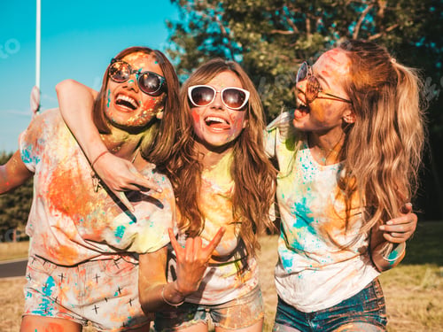 Preview: Portrait of three young beautiful women posing outdoors