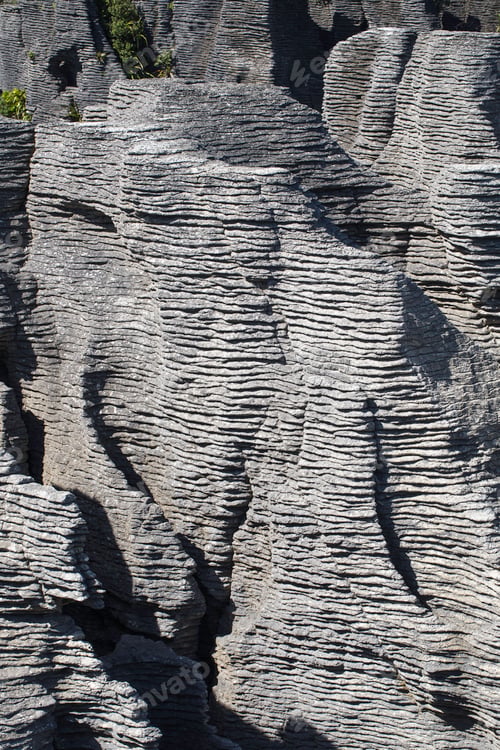 Preview: Stunning pancake rocks and lush greenery in new zealand's punakaiki landscape.