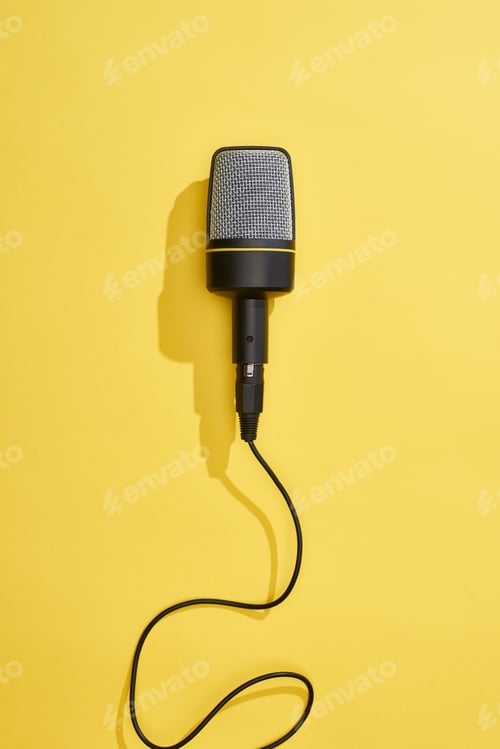 Preview: top view of microphone on bright and colorful background