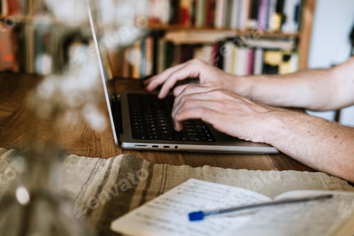 Preview: Close up of Freelance remote worker in his home office