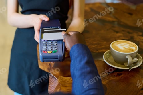 Preview: Man paying for his coffee