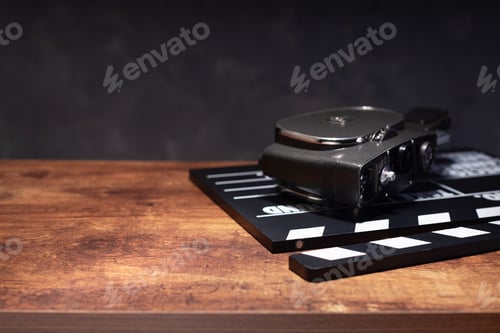 Preview: vintage retro film camera and movie clapper board