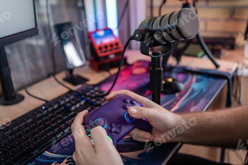 Preview: Gamer streaming live, playing video games with controller and professional microphone setup