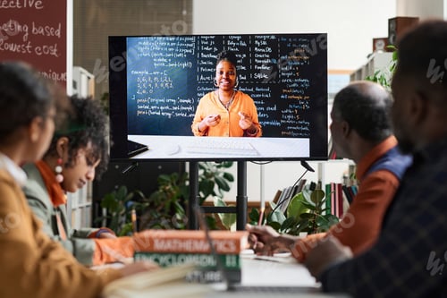Preview: Female professor on computer screen giving online class