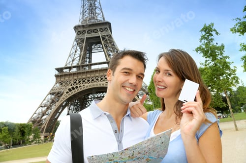 Preview: Couple In Front Of The Eiffel Tower Holding Tourist Pass