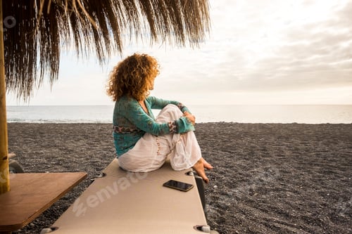 Preview: beautiful caucasian people model sit down at the beach