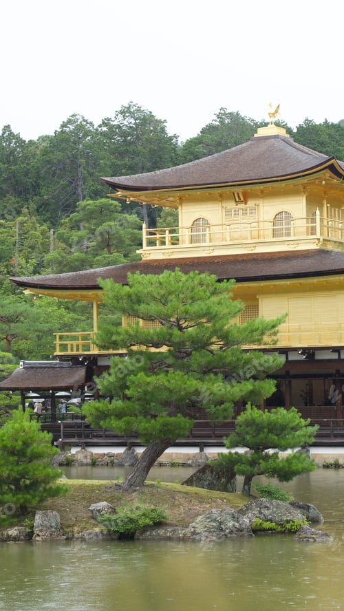 Preview: Beautiful Kinkaku-ji temple in a peaceful Japanese garden, encircled by a calm lake