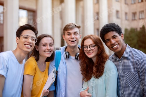Preview: Joyful Multiethnic Students Posing Smiling To Camera Standing Outside College