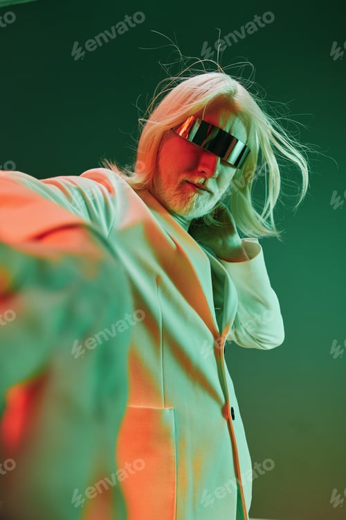Preview: Futuristic portrait of a stylish man in a light suit with sleek hair and modern sunglasses