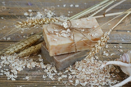Preview: Natural handmade soap, oat flakes and wheat ears on wooden background