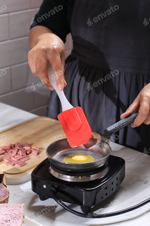 Preview: Cooking Process Pieces of Butter or Margarine Melted in a Frying Pan