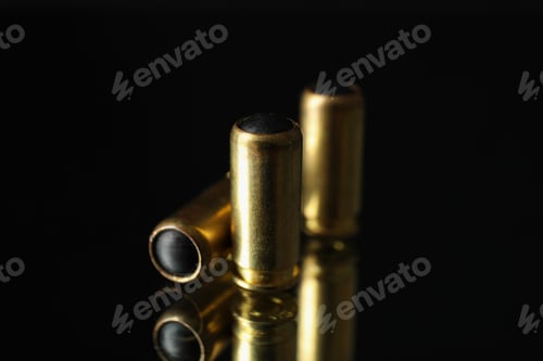 Preview: Rubber bullets on mirror background. Self defense weapon