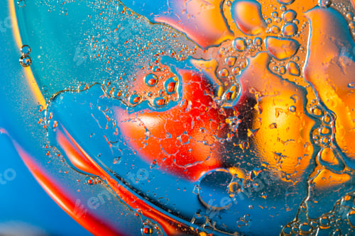 Preview: Abstract background of drops of liquid in red and blue tones