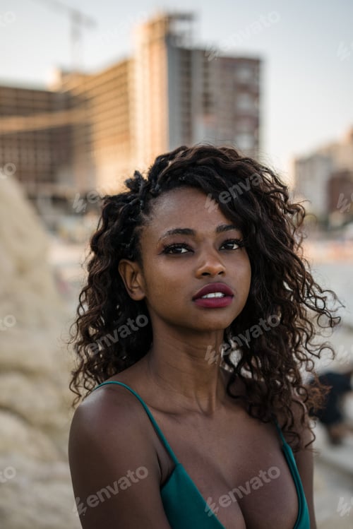 Preview: Wonderful black woman with curls outside
