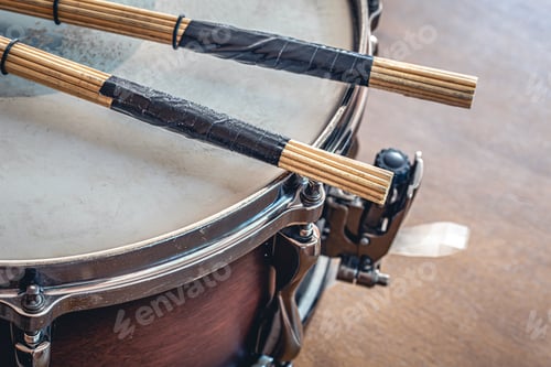 Preview: Close-up, drumsticks on a blurred background.