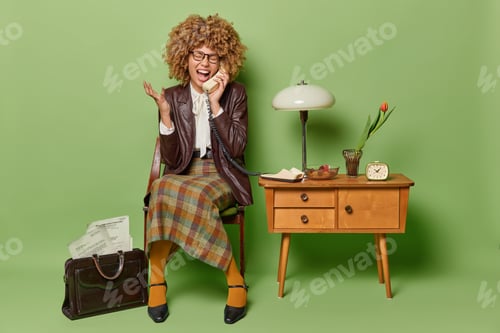 Preview: Back in time concept. Indoor photo of young happy smiling broadly African american woman wearing