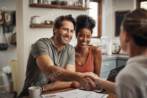 Preview: Couple Meeting Advisor Shaking Hands in Modern Kitchen