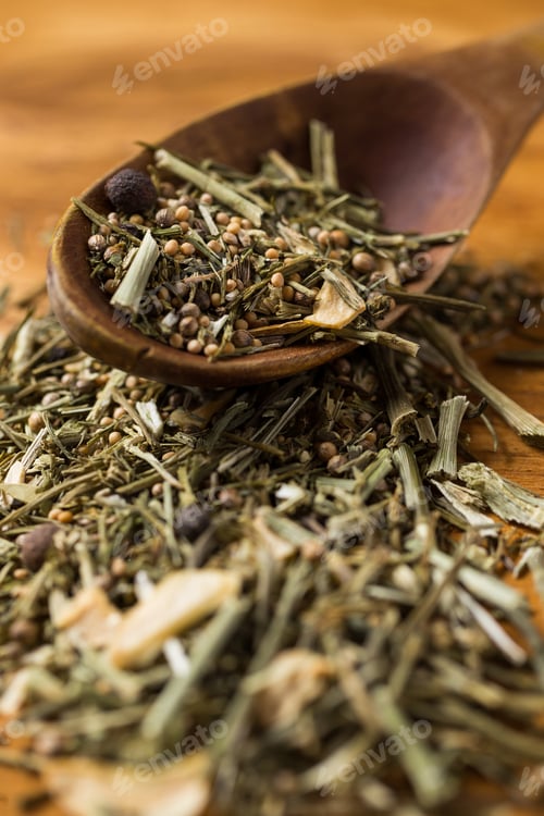 Preview: Spoon and heap of greens on the table