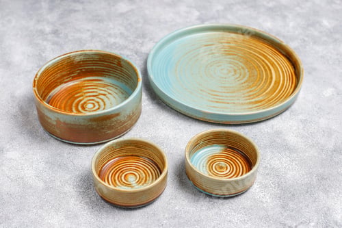 Preview: Different ceramic empty plates and bowls.
