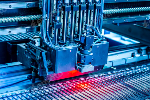 Preview: Close-up surface-mounting machine in progress