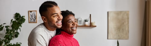 Preview: Joyful moments shared by a happy couple in cozy sweaters during winter indoors