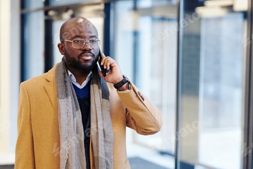 Preview: Businessman having a conversation on the phone