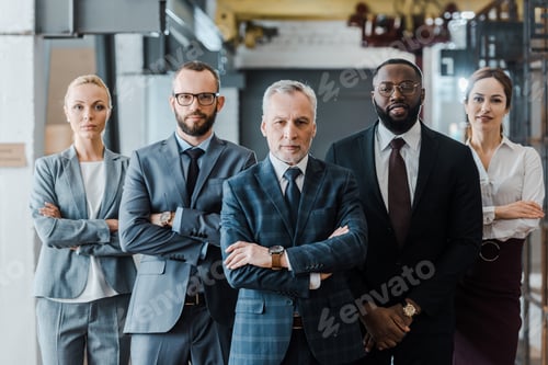 Preview: successful multicultural businessmen and businesswomen standing with crossed arms and looking at