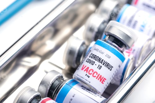 Preview: virus vaccine development of a coronavirus COVID-19, vaccine bottle in concept of insurance