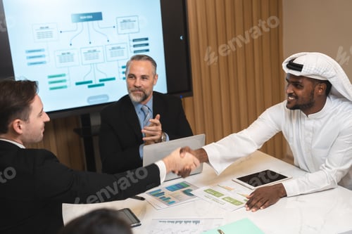 Preview: Emirate man having business deal agreements with partnership team, Arabian manager making handshake