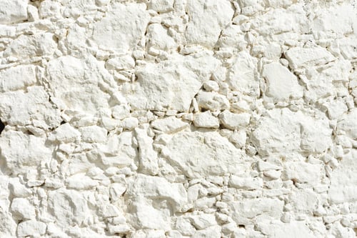 Preview: White aged plaster wall with crack background