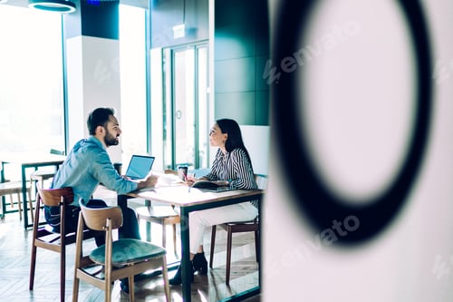 Preview: Business people negotiating in meeting room