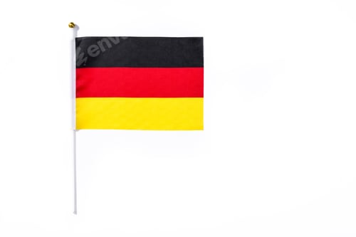 Preview: German flag waving on white background: symbol of national pride