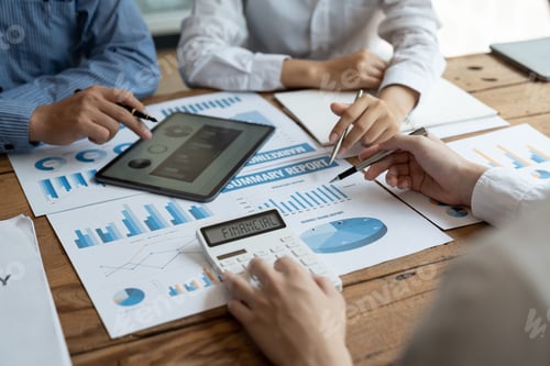 Preview: Business Meeting Discussing Financial Report Using Technology