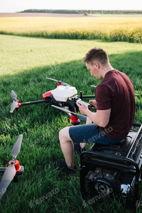 Preview: smart agriculture industry concept, drone in precision farm use for spray a water.