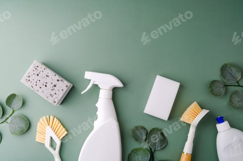 Preview: Green background with cleaning supplies and leaves. Clean home concept.