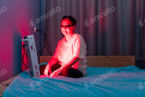Preview: Adult Woman on Bed with Light Therapy