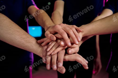 Preview: Pile of hands of young contemporary successful cybersports video gamers