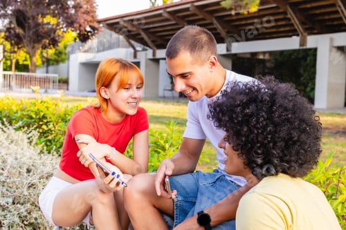 Preview: Students sharing funny content on smartphones in university campus