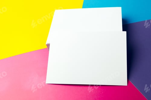 Preview: Business card blank over colorful abstract background.
