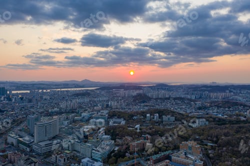 Preview: Aerial view of Seoul cityscape captured at sunset in spring