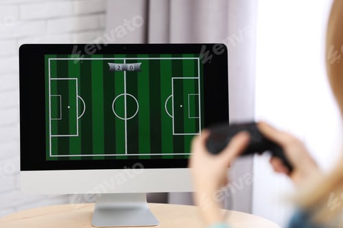 Preview: Young woman playing video game at home, closeup