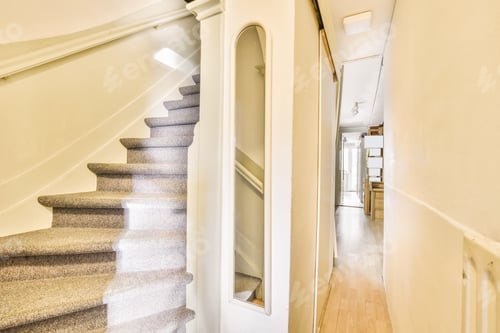 Preview: Nice staircase with gray carpet and white walls