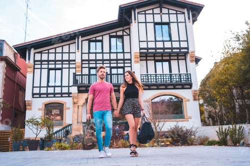 Aperçu: A Caucasian couple leaving the hotel after spending their wonderful vacation