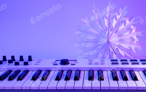 Preview: Christmas background with midi keyboard and holiday decor with neon lights.