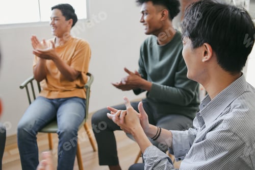 Preview: Portrait of Diversity Group Clapping Hands Together During Mental Health Therapy Session