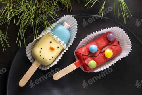 Preview: Christmas dessert. Sweet food. Cheesecake on a stick in the shape of ice cream. Children's treat in