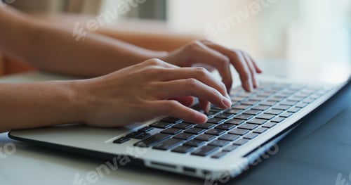 Preview: Woman type on laptop computer