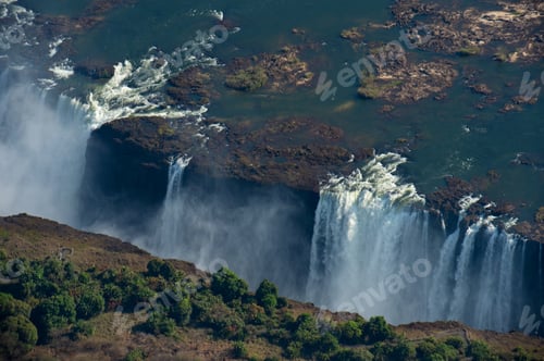 Preview: Aerial View of Majestic Victoria Falls Cascading Into the Zambezi Gorge