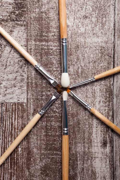 Preview: Make up brushes on wooden background